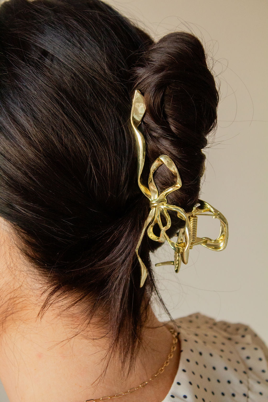 Gold Bow Squiggle Claw Clip